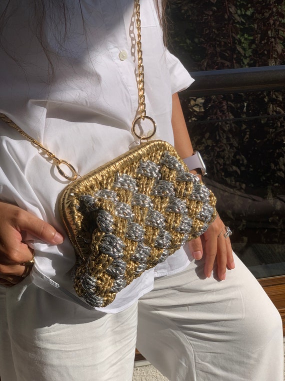 goldene handtasche